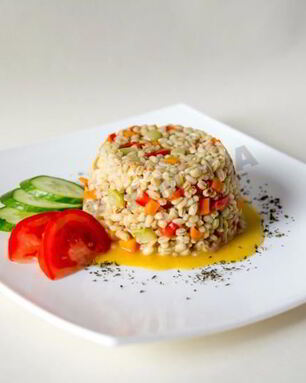 Ризотто из перловки с овощами