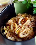 Ризотто с кальмарами и кукурузой